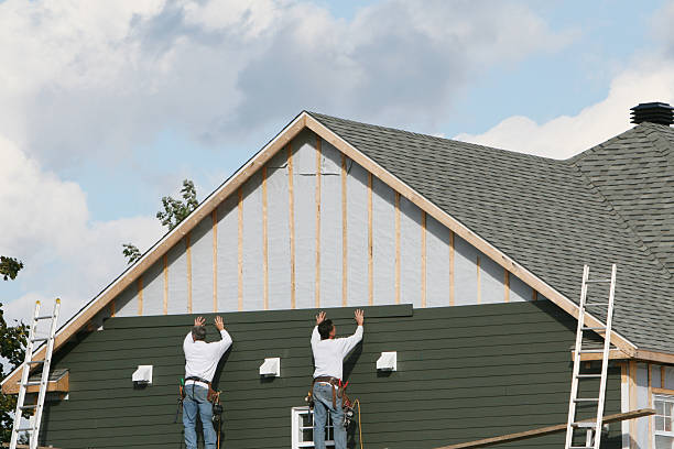 Professional Vinyl Siding technician working in Spartansburg, PA